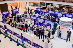 Macau International Airport route promotion event at Nova Mall showcasing new routes, smart services, and airline partnerships with live performances and audience engagement.