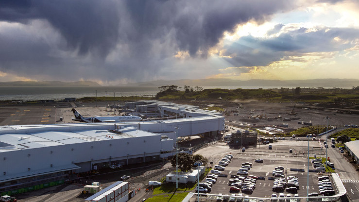 Travellers at Auckland Airport during the New Zealand winter school holiday period, as the airport prepares for increased international passenger demand and busy departure days.
